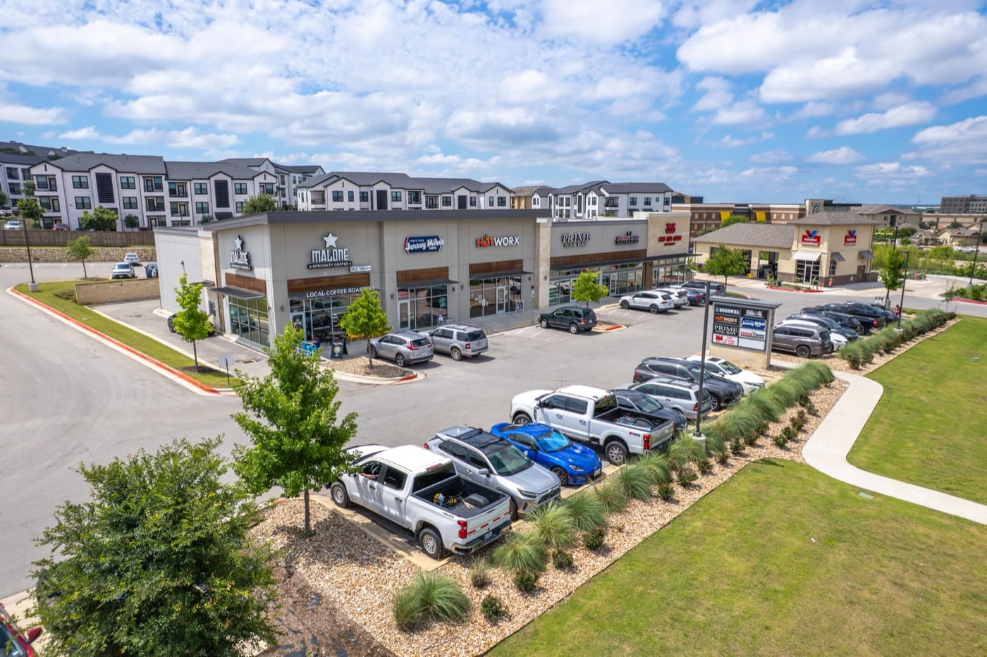 Retail center with apartments behind it